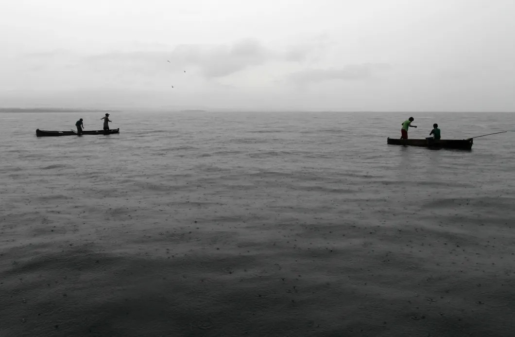 Рыбалка в сезон дождей. Фото: Reuters