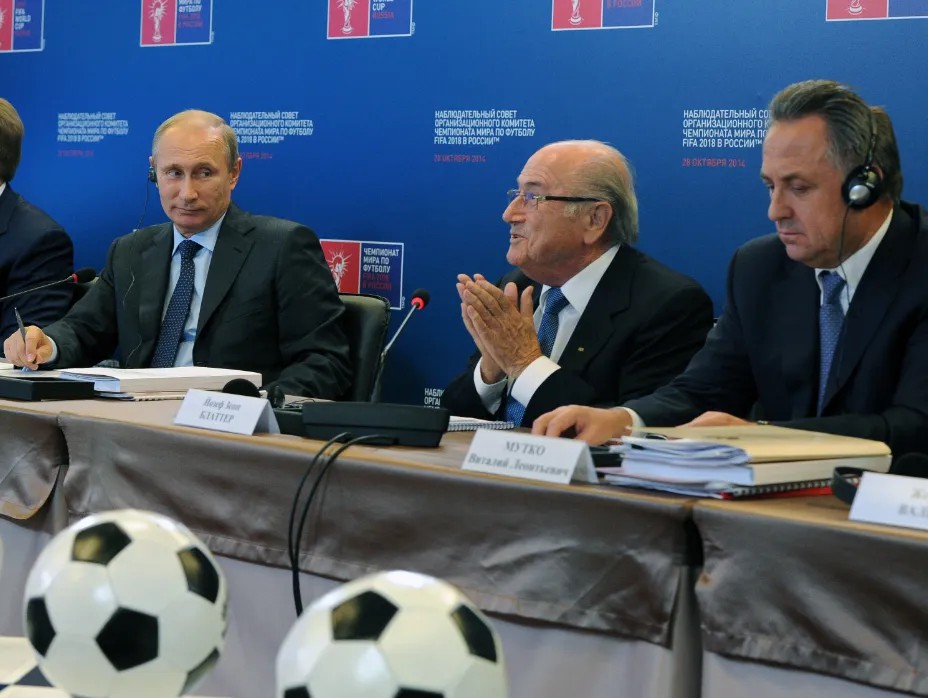 Владимир Путин, глава ФИФА Йозеф Блаттер, и министр спорта Виталий Мутко. Фото: РИА Новости