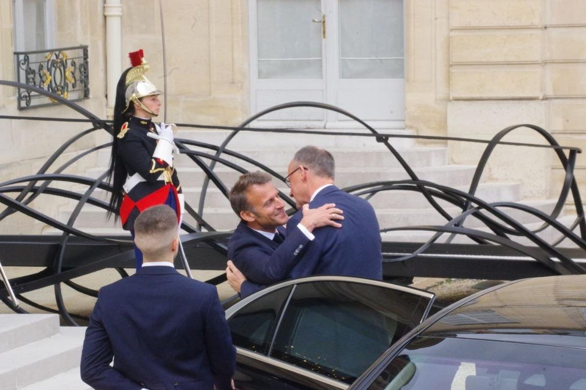 Макрон и Мерц. Архивное фото: Юрий Сафронов / «Новая газета»