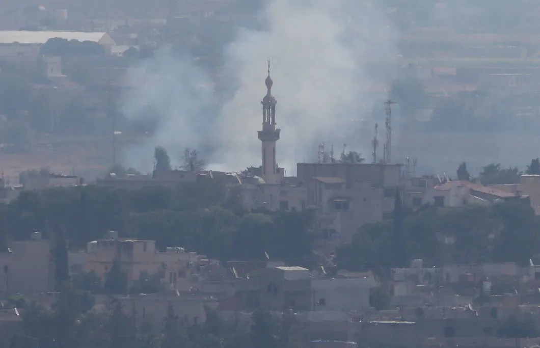 Последствия обстрела сирийского города вблизи турецкой границы. Фото: Reuters