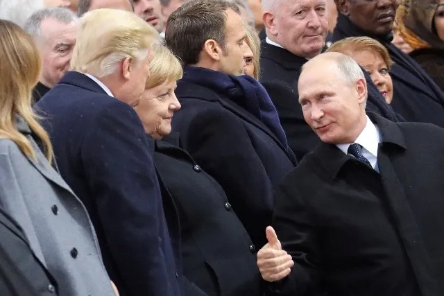 После рукопожатия Путина и Трампа. Фото: Reuters