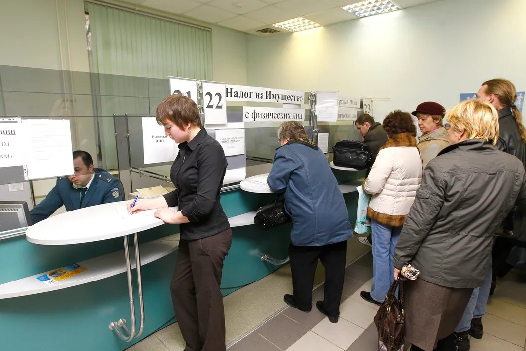 Прием посетителей в московской налоговой инспекции, 2010 г. Фото: РИА Новости