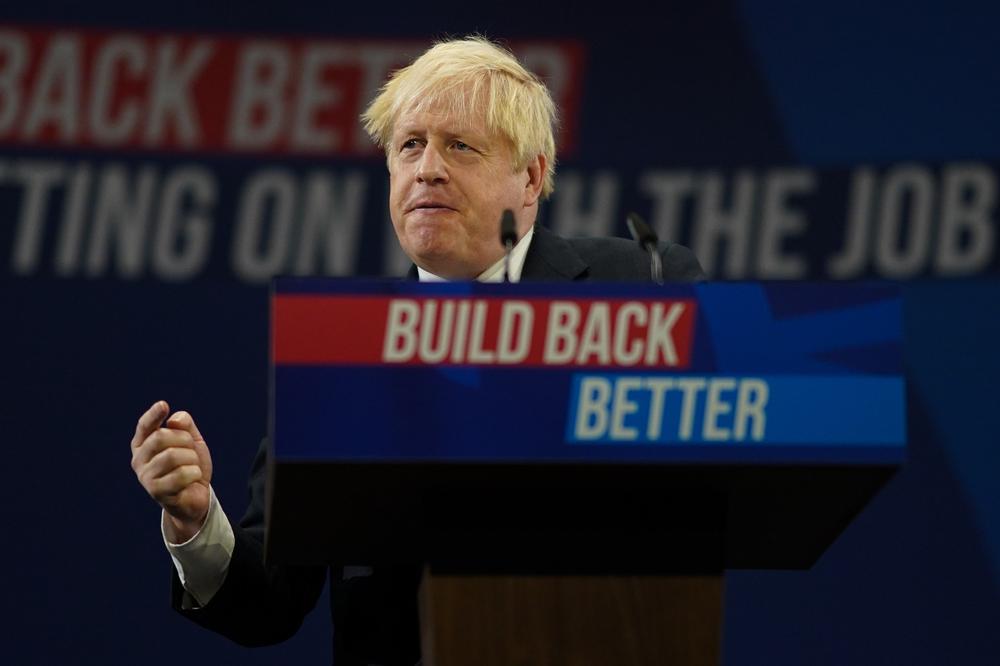 Борис Джонсон выступает с программной речью на конференции Консервативной партии, 6 октября. Фото: Ian Forsyth / Getty Images