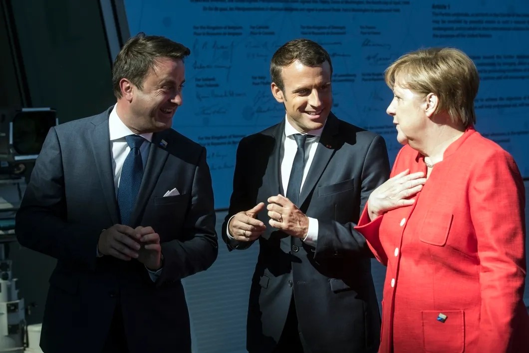 Встреча глав-государств, входящих в НАТО. Премьер Люксембурга, президент Франции и канцлер Германии. Фото: EPA