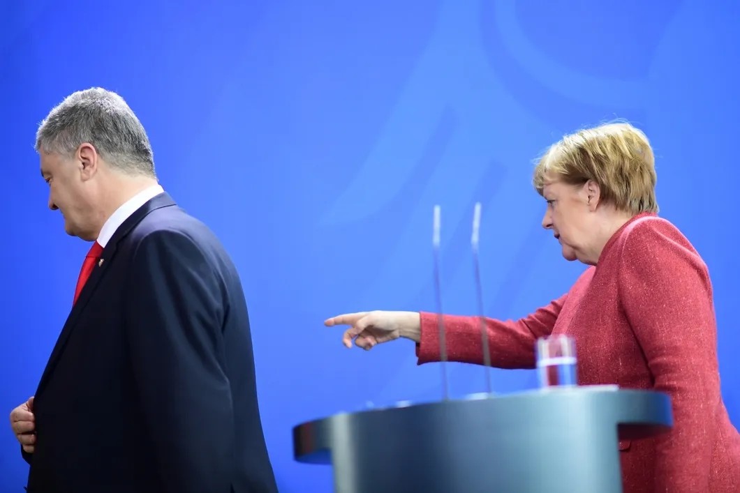 В отличие от Макрона, Меркель не стала искать встреч с Зеленским. Фото: EPA
