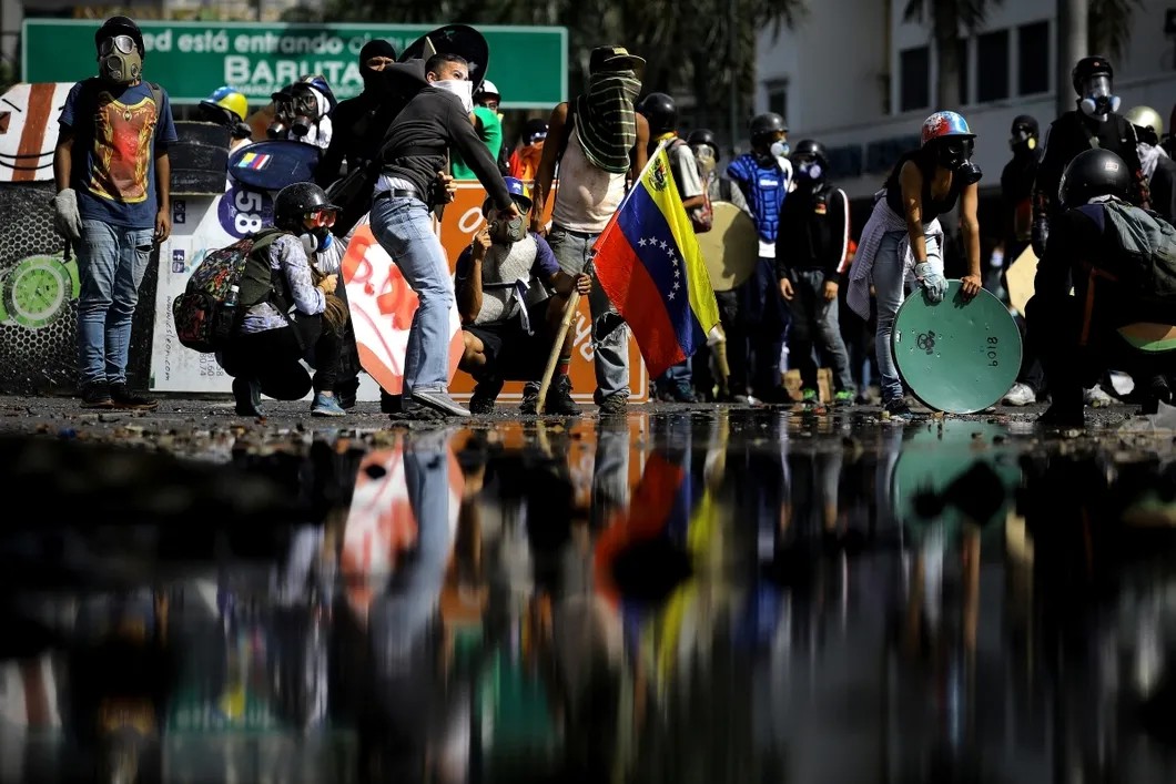 Протесты в Венесуэле. Фото: Reuters