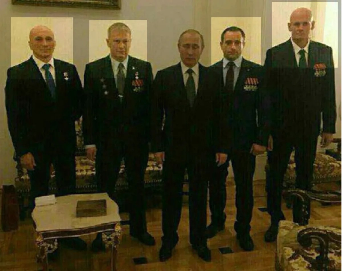 Famous photo from the Day of Heroes of the Fatherland in Kremlin. From left to right: Andrei Bogatov, Andrei Troshev, Vladimir Putin, Alexander Kuznetsov, Dmitry Utkin (Wagner). Four of them are already in the EU Sanctions lists.