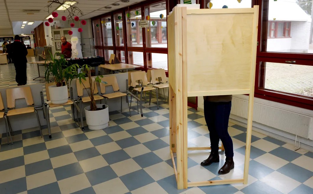 На выборах в парламент Финляндии. Фото: Mikko Stig / РБК