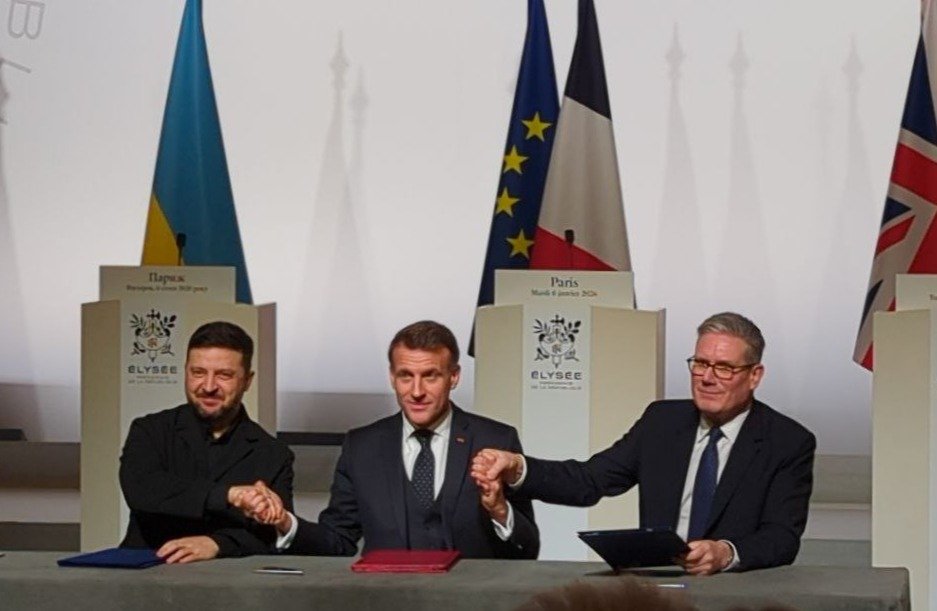 Подписание декларации о развертывании многонациональных сил в Украине после заключения перемирия. Фото: Юрий Сафронов / «Новая газета»