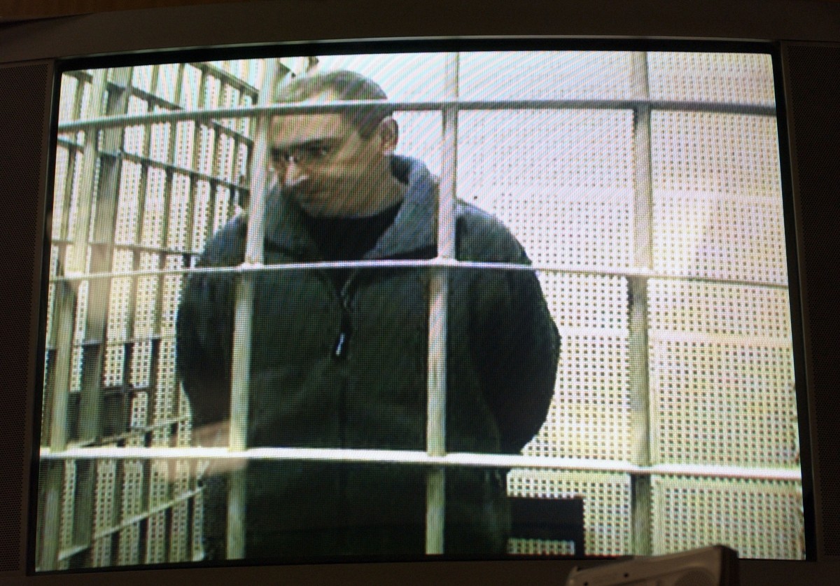 Михаил Ходорковский за решеткой. 2004-й год. Фото: Федор Савинцев / ТАСС