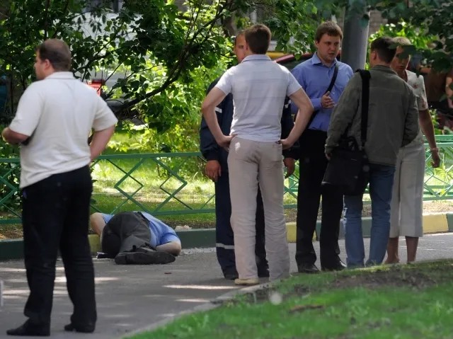 Полиция и следователи на месте убийства Юрия Буданова в Москве. Фото: РИА Новости