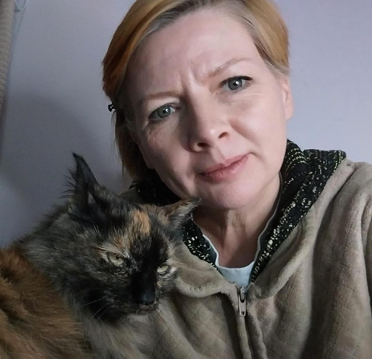 Ольга Комлева с котом. Фото из семейного архива