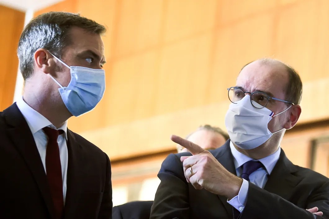 Министр здравоохранения Оливье Веран и премьер Жан Кастекс. Фото: EPA