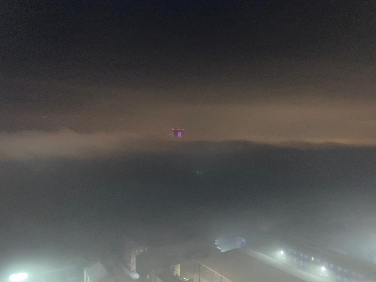 7 января 2025. Красноярск под смогом, снято с 21 этажа дома на горе. Фото Алексей Тарасов / «Новая газета»