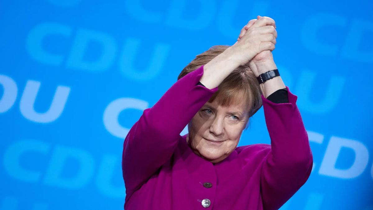 Меркель снова у власти