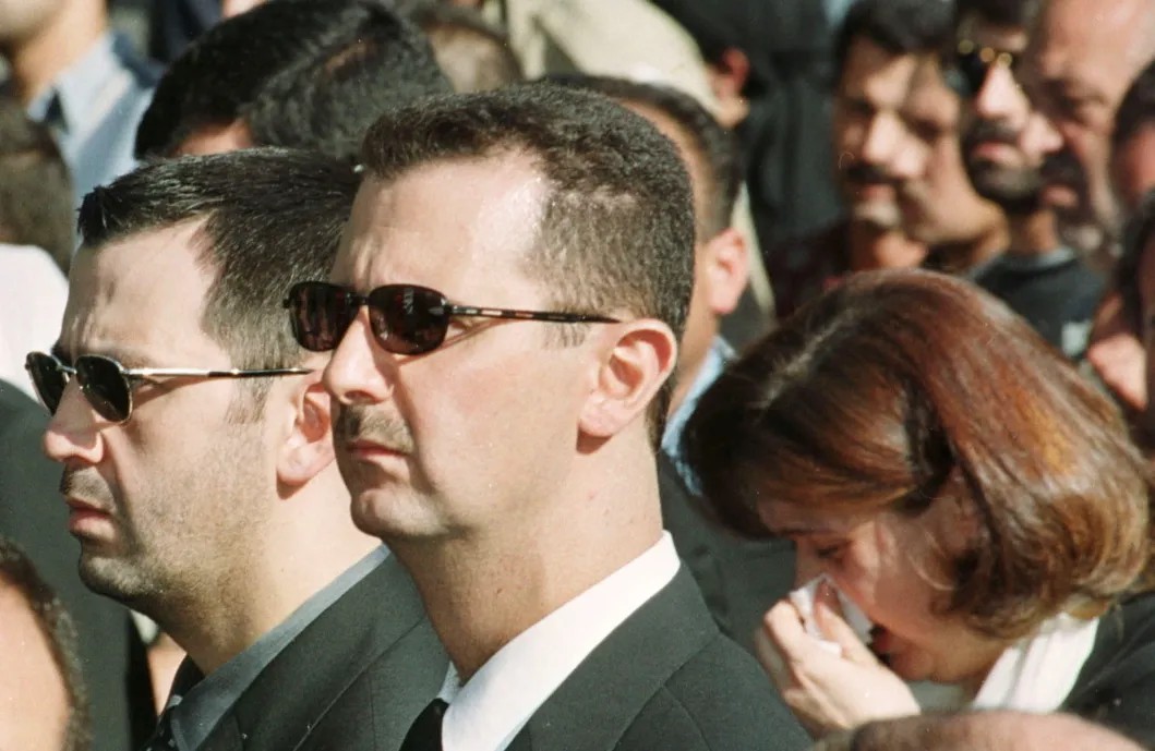 Two brothers – General Maher Assad and Syrian President Bashar Assad. Photo: Reuters