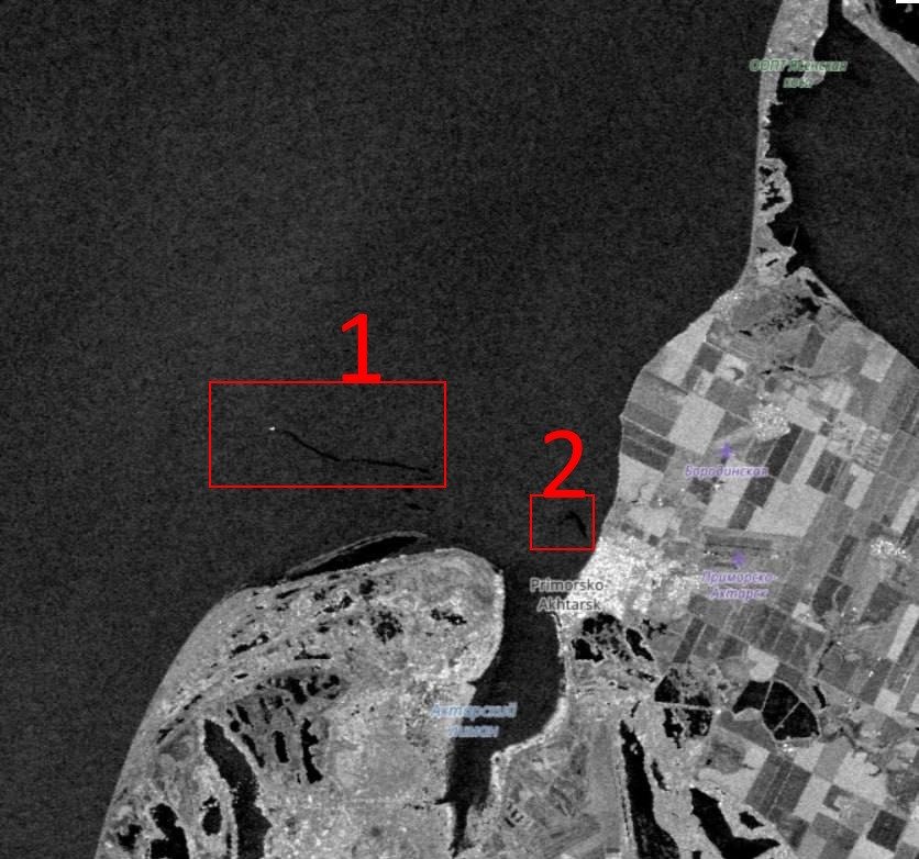 Спутниковые снимки, виден мазутный след (1 и 2) за судном (точка в квадрате 1)