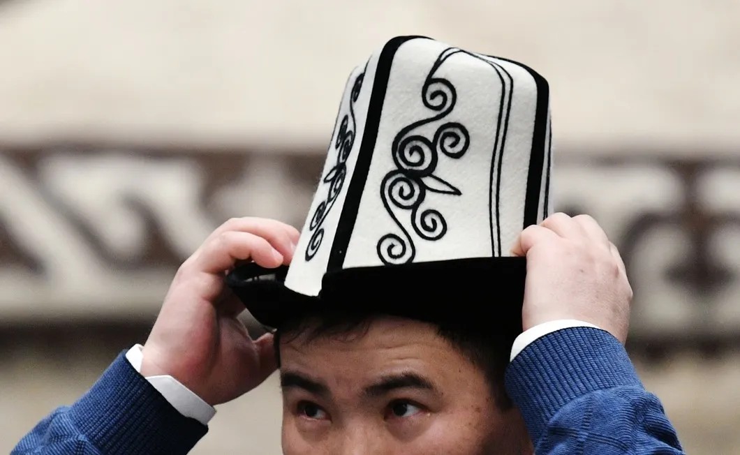 Участник праздника национального головного убора ак калпак в Москве. Фото: РИА Новости