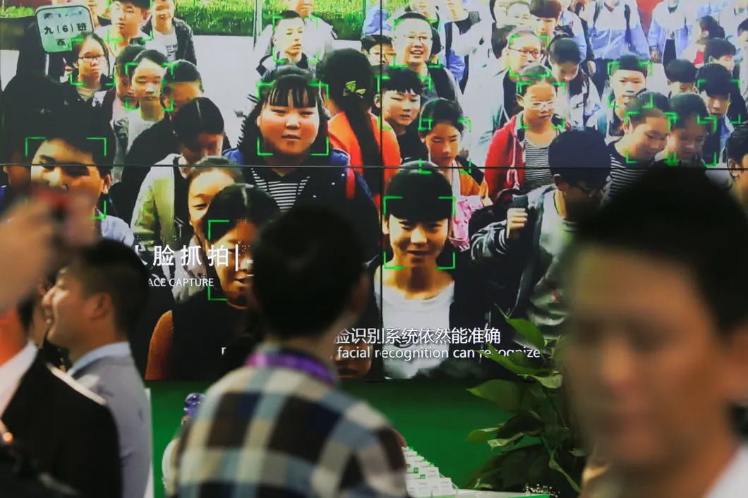 Демонстрация системы распознавания лиц в Китае. Фото: Reuters
